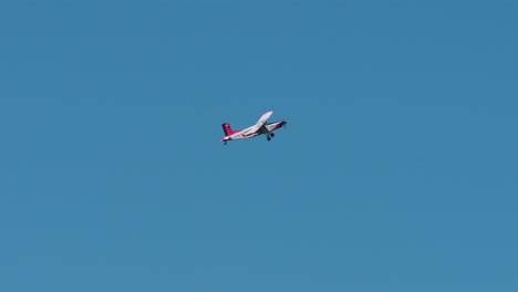 small airplane against blue sky