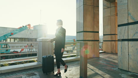 suitcase, business travel and woman at airport