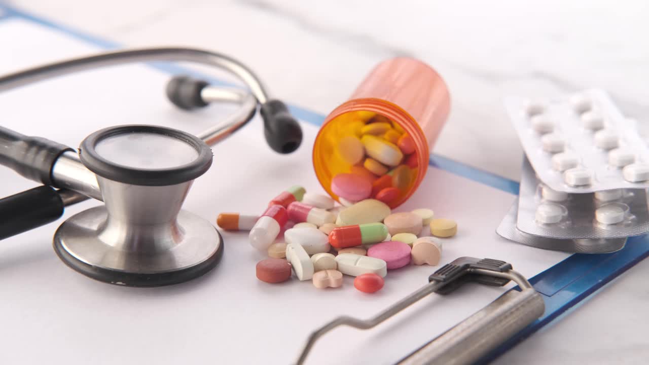 Medical Supplies and Pills on Clipboard