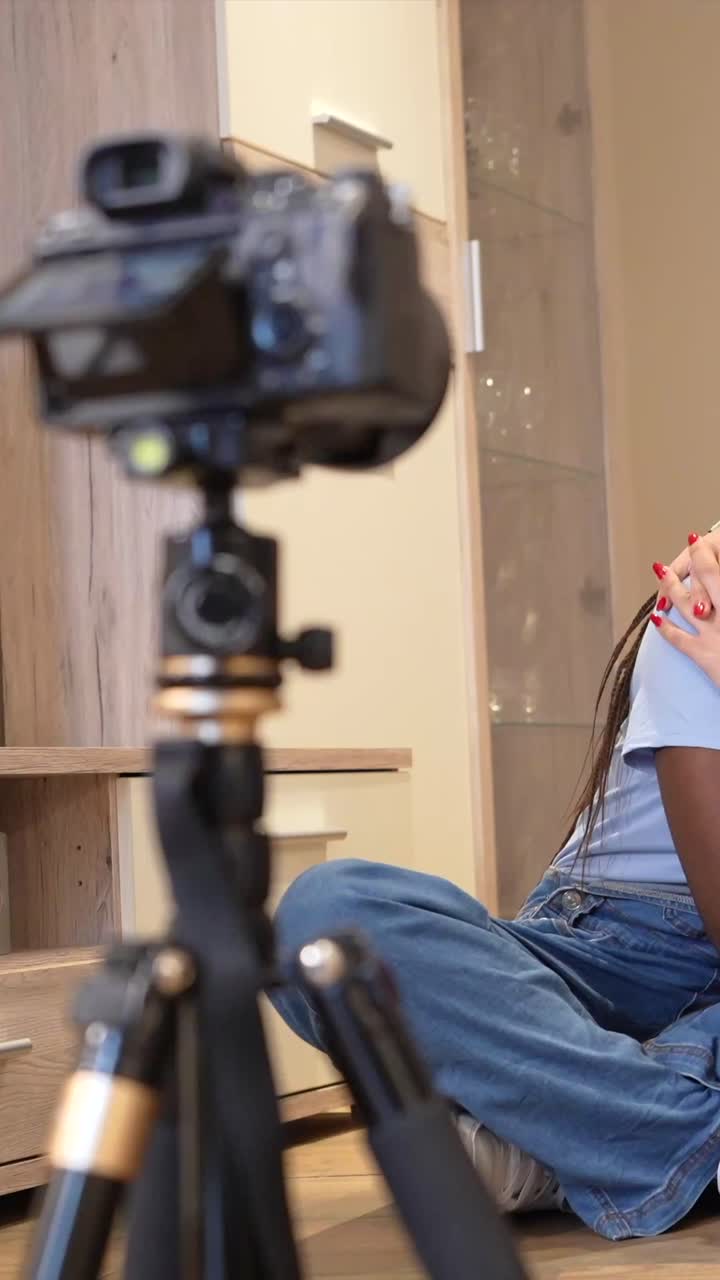 Two young women recording a video together