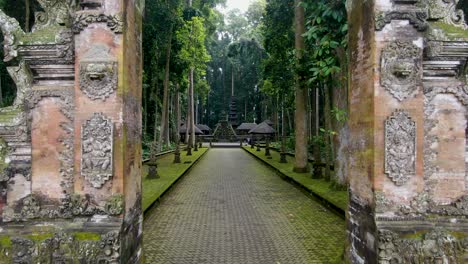 Majestic-pathway-leading-towards-iconic-temple-of-Sangeh,-dolly-forward