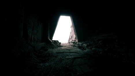 light floods through a dark tunnel leading to an unknown destination