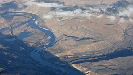 river through ruggedness: aerial view of fraser river and coquihalla mountains