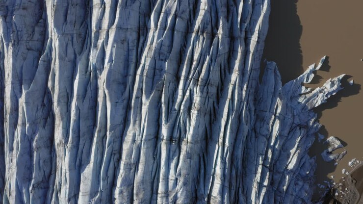 Aerial: Top down view of Svinafellsjokull glacier in Iceland during a sunny day