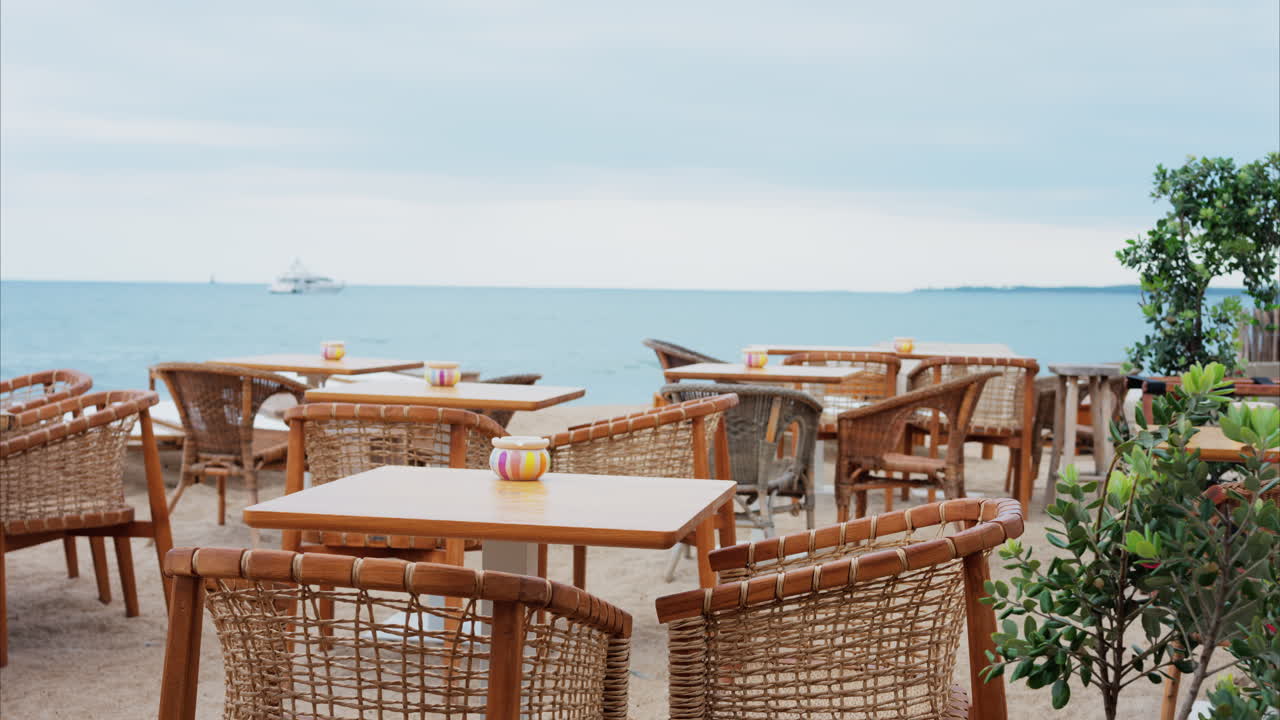 Empty tables at a beach terrace in the evening