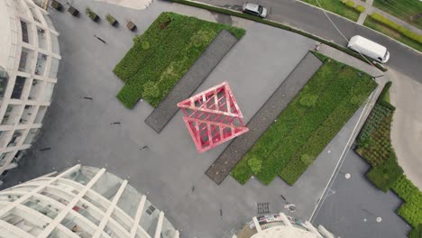 Aerial-rocket-shot-of-Mexico-City-plaza,-modern-architecture,-and-busy-streets