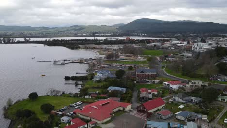 lakefront suburb of ohinemutu with yacht club and anglican church in new zealand