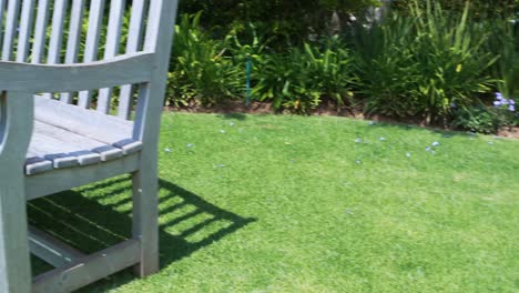 Empty-bench-in-garden