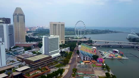 drone shot of singapore flyer during the day