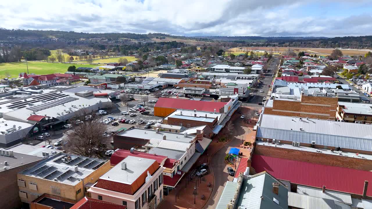 Drone footage of a main street in Armidale suburb