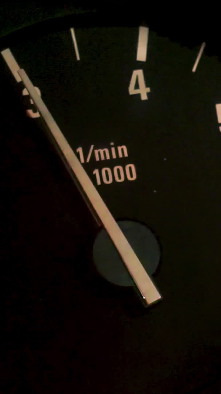 Close-up of a vintage car speedometer/tachometer