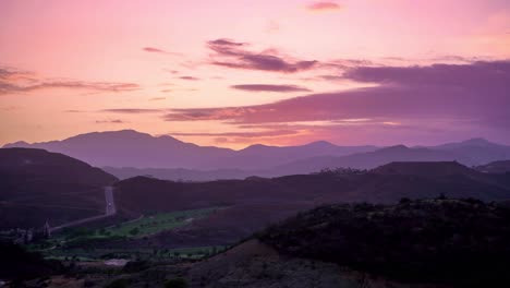 time lapse purple orange sunset marbella mountains, vacation destination, clouds moving beautiful scene