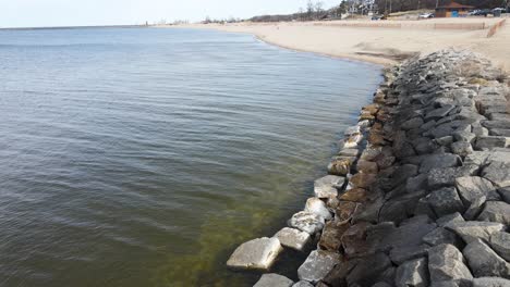 showing the stones that have been acting as a levee at pere marquette