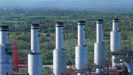 aerial telephoto shot around the chimneys on a power station vessel