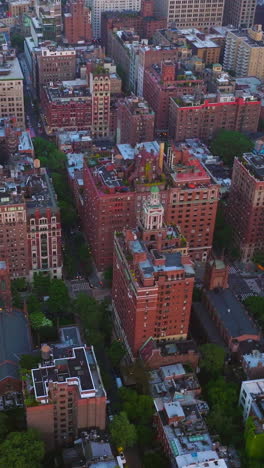 daytime panorama of remarkable new york. drone footage over the diverse buildings of metropolis. aerial view. vertical video