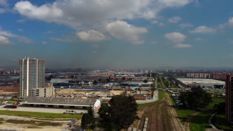 As-the-drone-gracefully-glides-over-the-bustling-streets-of-Bogotá,-the-city's-vibrant-energy-sets-the-stage-for-our-exploration