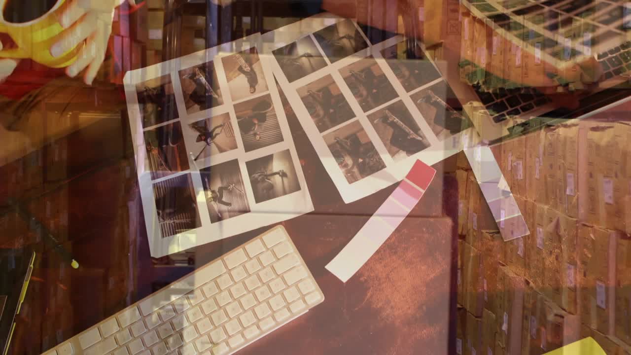 Animazione di mani in primo piano di diversi colleghi che scelgono fotografie su scatole in magazzino