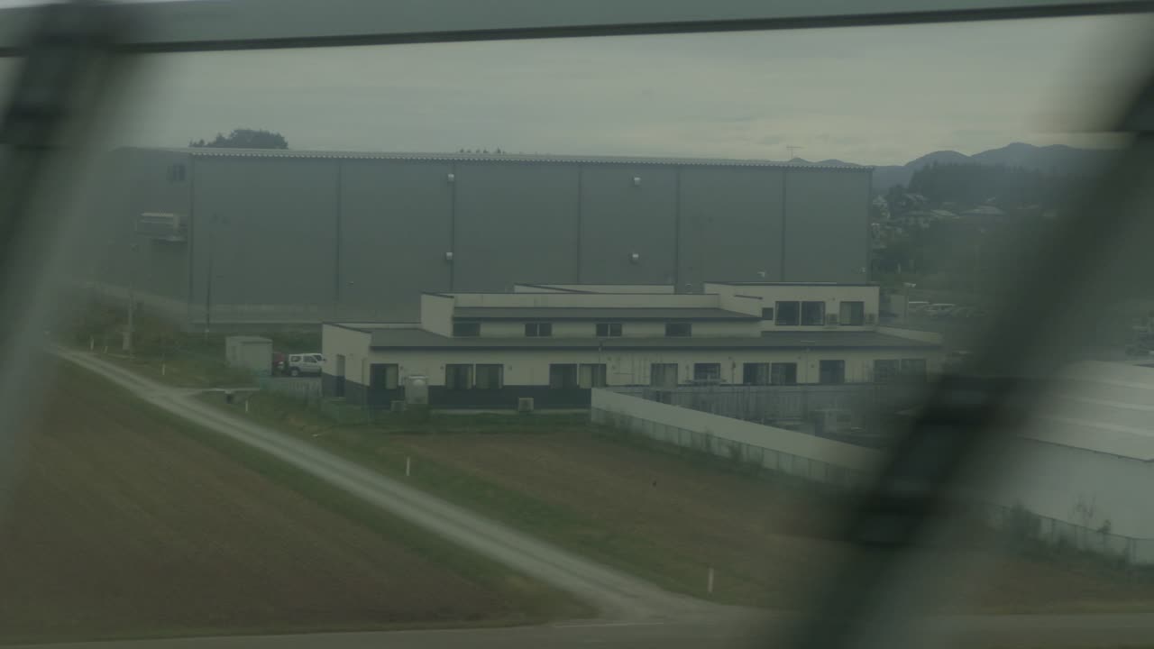 Japan’s Green Hills and Villages: A Shinkansen Journey Discover rural Japan from the Shinkansen, where green mountains, small villages, and farmlands create a picturesque scene