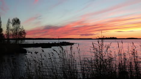 crimson sunset on the background of the gulf of bothnia