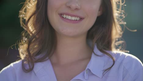 close-up shot of pretty young caucasian female mouth laughing