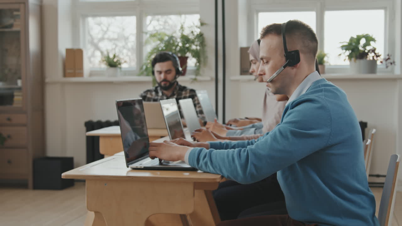 Portrait of Happy Man Working at Call Center