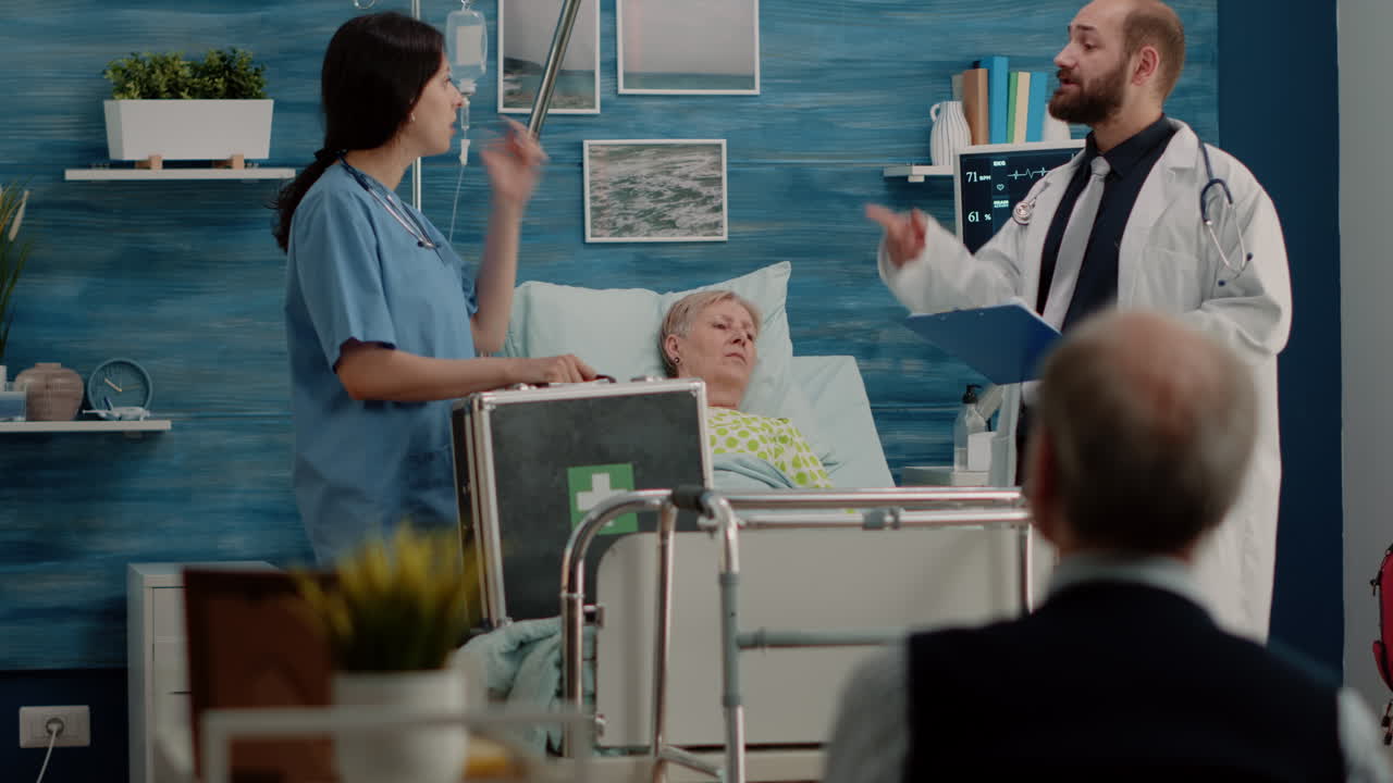 Doctor and nurse doing checkup visit for ill patient in hospital bed