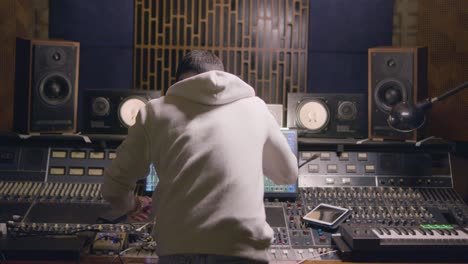 man working at music recording studio