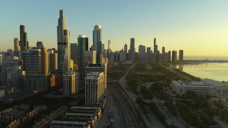 aerial, beautiful chicago skyline from south loop during summer sunrise
