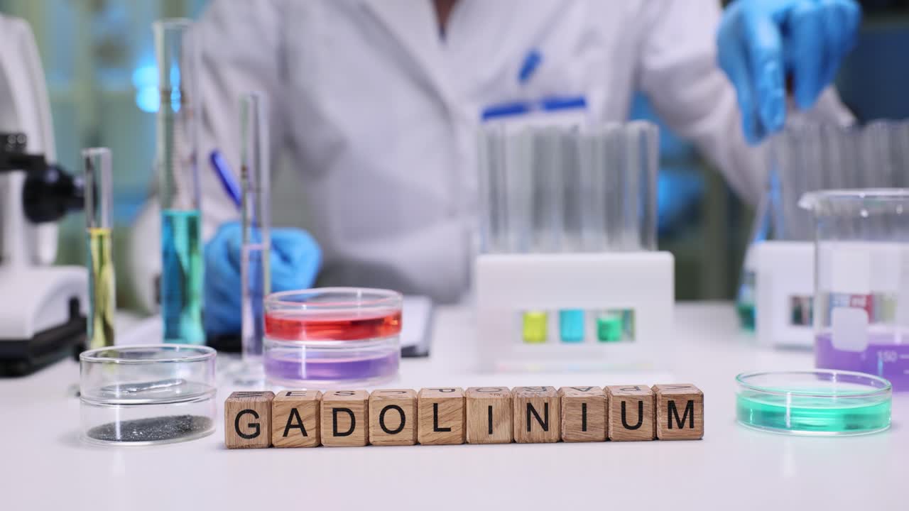 Scientist Working with Gadolinium in a Laboratory
