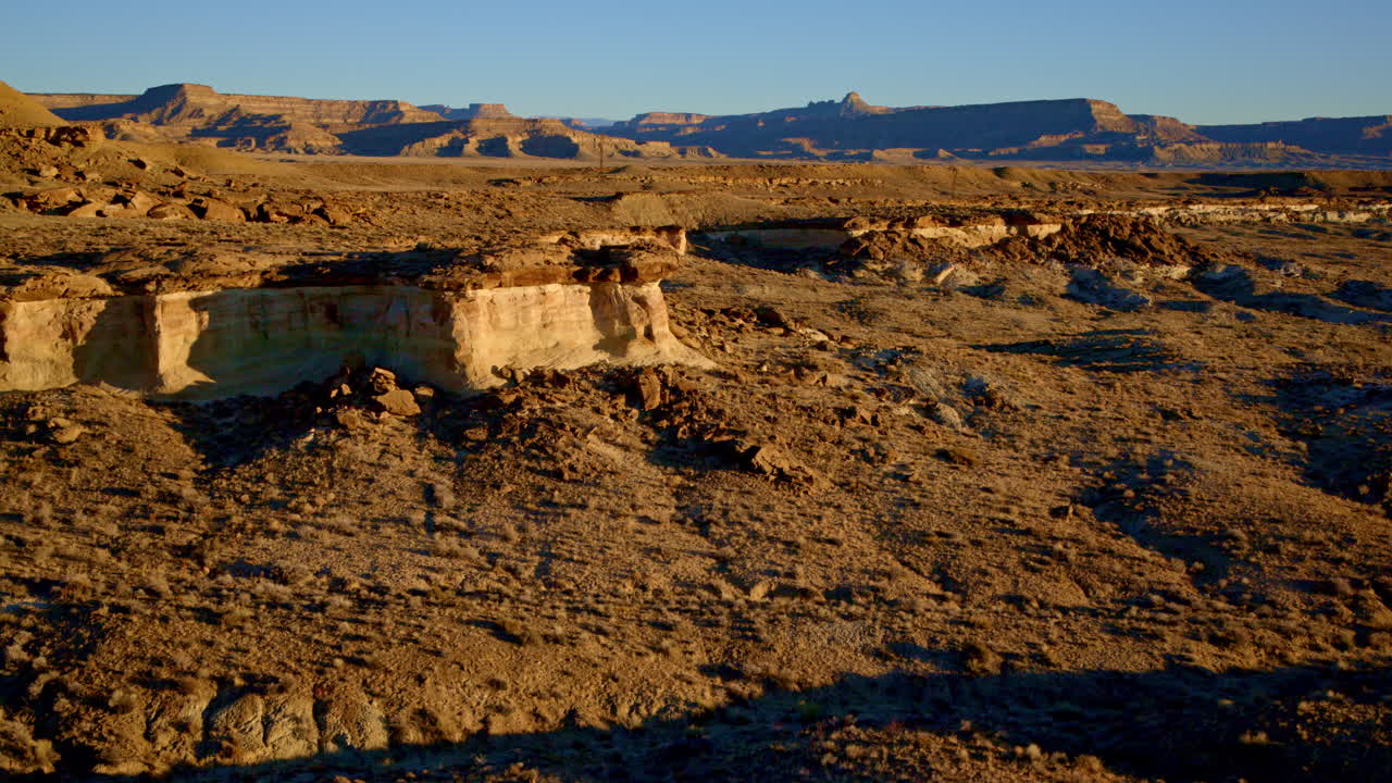 Slow, dramatic drone footage showcases the breathtaking colors and rock spires near the Utah-Arizona border.