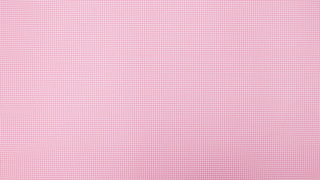 Friske æg vises i en cirkel på lyserødt tema. Stop-motion