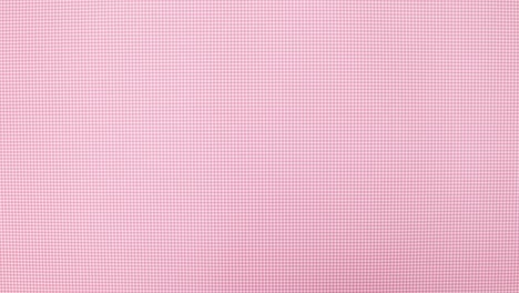 los huevos frescos aparecen en círculo en el tema rosa. detenga el movimiento