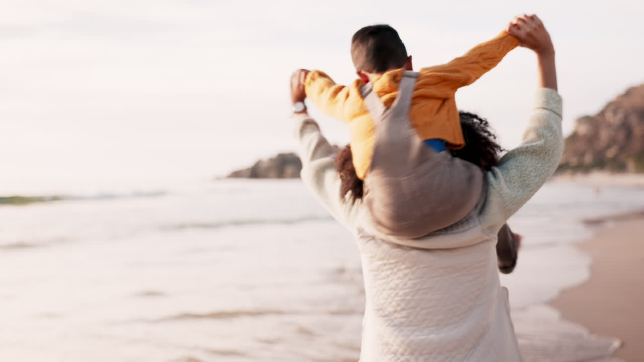Family, piggyback and play on beach at sunset