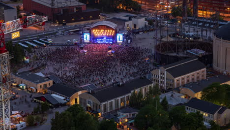 time lapse of a crowd and stage at the tuska festival, night in helsinki, finland