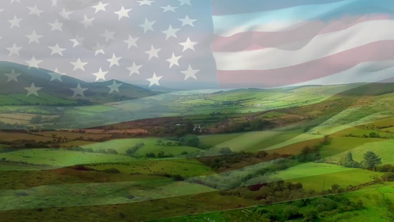 animación de la bandera de los estados unidos ondeando sobre un paisaje verde