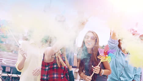 friends celebrating with colorful smoke