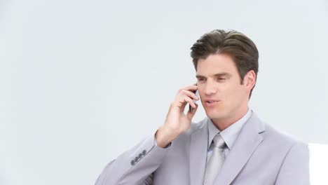 charming businessman talking on phone