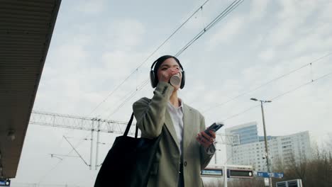 woman commuting at train station