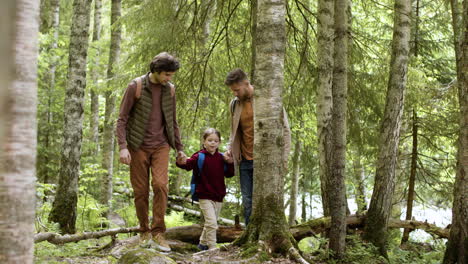 happy family walking in nature