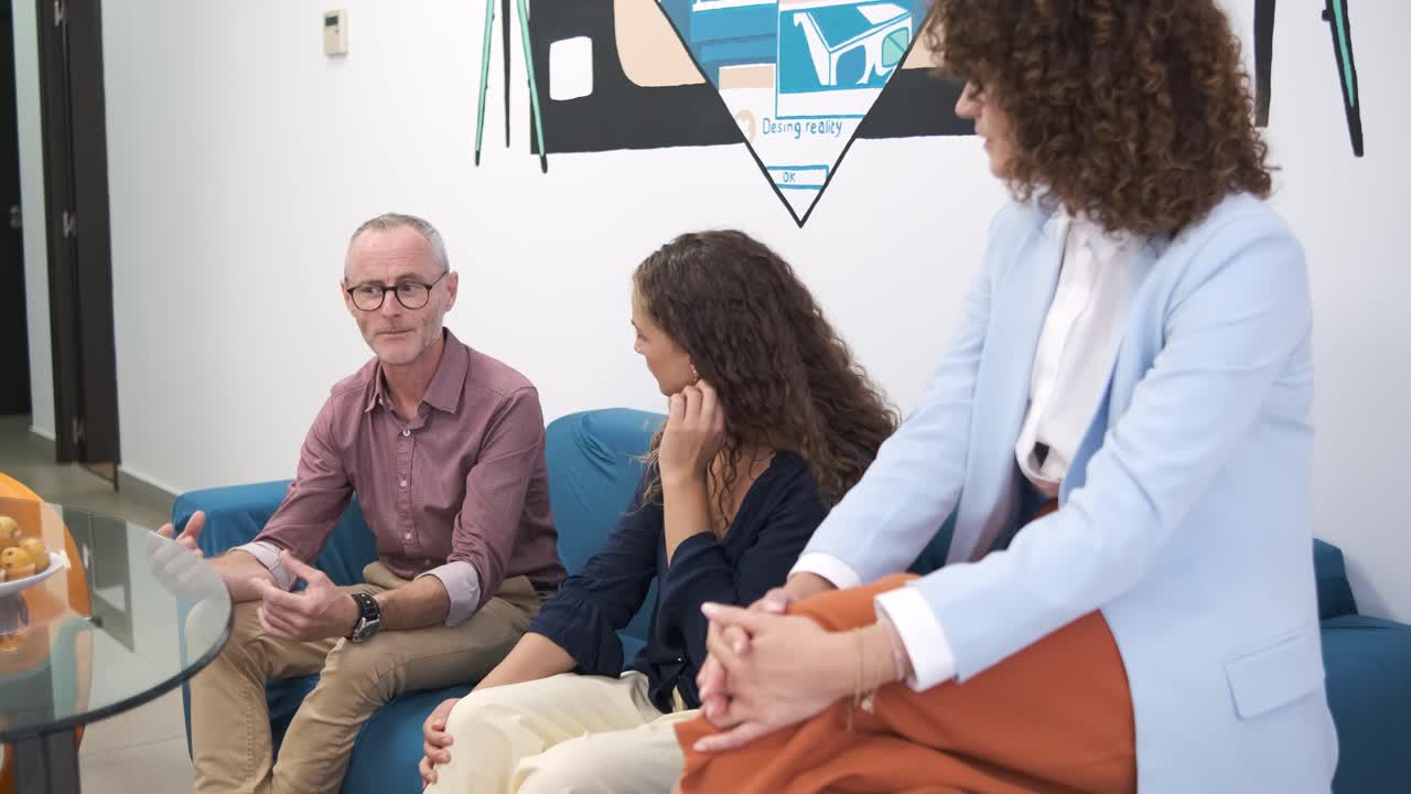 Manager explaining strategy to marketing team in slow motion