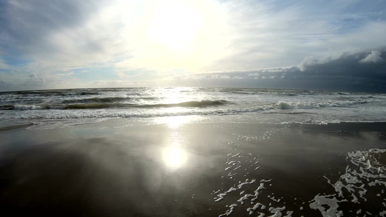 Sandy beach with waves, North Sea, Jütland, Sondervig, Denmark, 4K