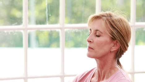 woman doing yoga at home