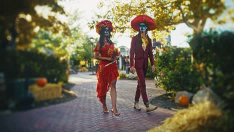 couple in day of the dead costumes