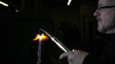 blacksmith metal forging in 120fps slow motion