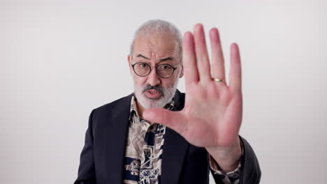 man gesturing stop with hand