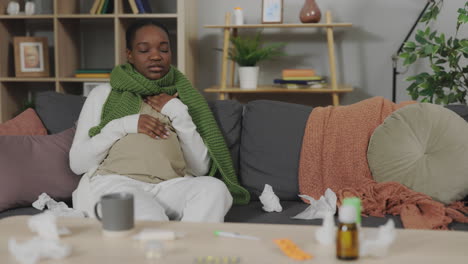 pregnant woman feeling ill at home