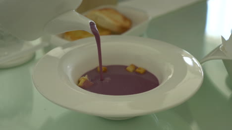 pouring sweet japanese purple potatoes soup