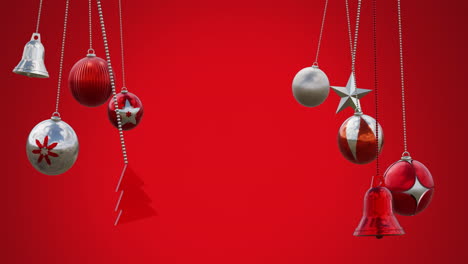 animation of baubles, tree, bells and star swinging against red background