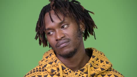 young handsome african man looking bored