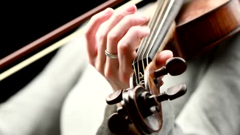 violinist playing - closeup of her hands